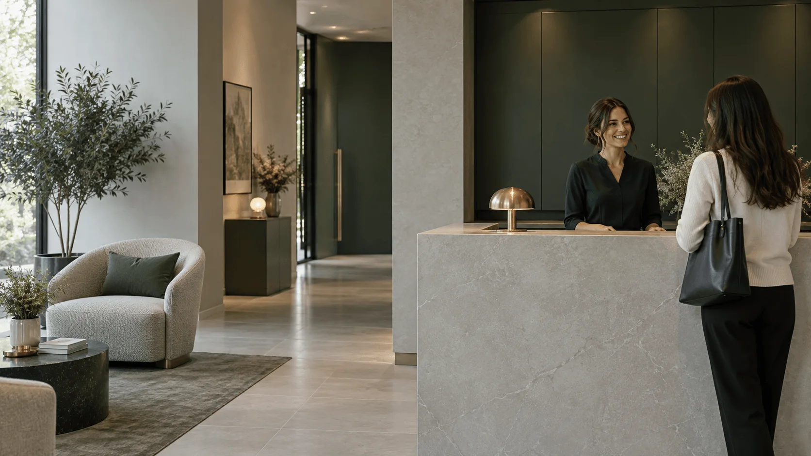 A patient greeted at the reception desk of a calm, stone-finished clinic